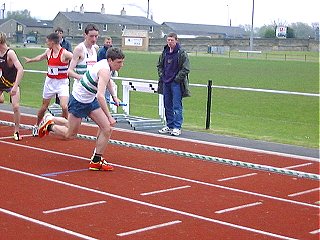 Alex Senior handing to Richard Markey U17 4x400m