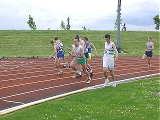 Michael O'Connor hands to Jonathan Shearn U17 4x100m