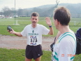 the team captain holds his hand up to Mark